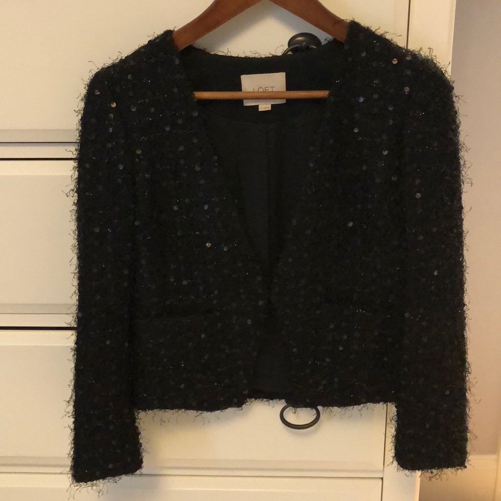 Sparkly cropped jacket.